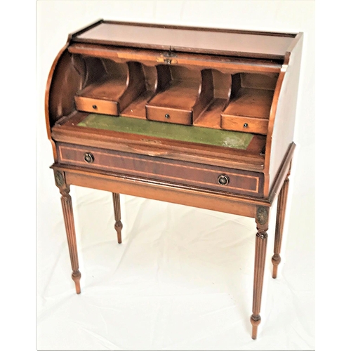 463 - YEW CYLINDER DESK
with a fitted interior and pull out leather inset shelf above a frieze drawer, sta... 