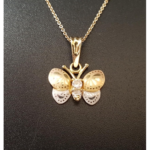 103 - CZ SET TEN CARAT GOLD BUTTERFLY BROOCH/ PENDANT
in two tone gold, on ten carat gold chain, total wei... 