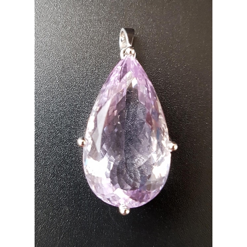 62 - IMPRESSIVE AMETHYST SOLITAIRE PENDANT
the large pear cut amethyst with faceted underside and measuri... 