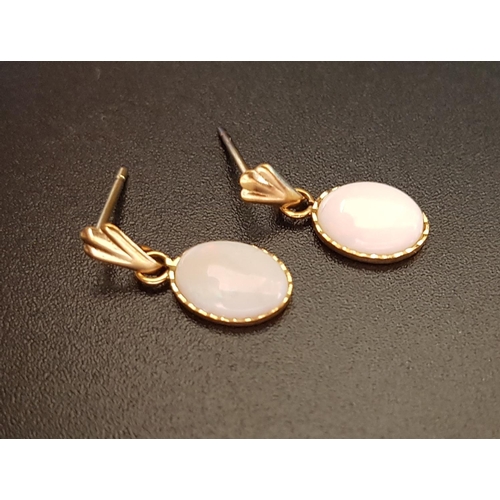 77 - PAIR OF OPAL DROP EARRINGS
in unmarked gold with nine carat gold butterflies