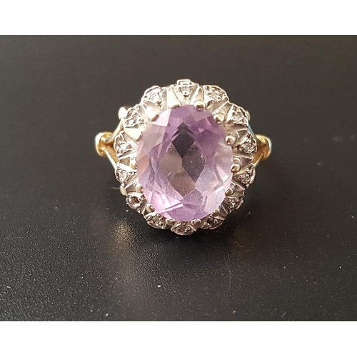 91 - AMETHYST AND DIAMOND CLUSTER DRESS RING
the central oval cut amethyst in illusion set diamond surrou... 