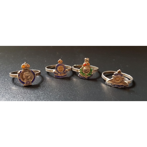 93 - FOUR SILVER SWEETHEART RINGS
comprising Royal Armoured Corps, Royal Artillery, Royal Marines and Roy... 