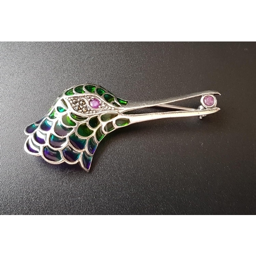 85 - RUBY, MARCASITE AND ENAMEL SILVER HUMMINGBIRD BROOCH
with ruby eye in marcasite surround and a furth... 