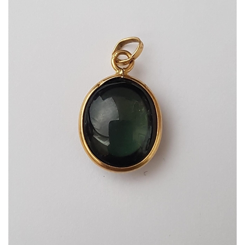 71 - FULL ROUNDED CABOCHON TOURMALINE PENDANT
in nine carat gold mount, 1.9cm high (including suspension ... 