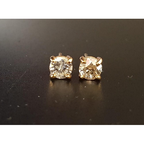 83 - DIAMOND SOLITAIRE EARRINGS
the round cut diamonds totalling approximately 1ct, in unmarked gold