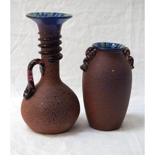 18 - TWO STUDIO GLASS VASES
both with blue and yellow interior and red/brown matt textured finish to the ... 