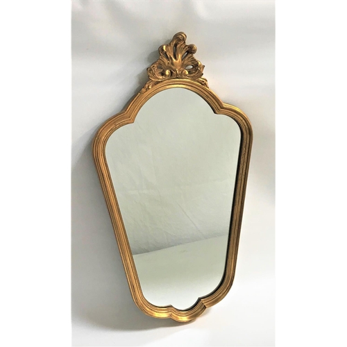 78 - GILT FRAME WALL MIRROR
with an arched shaped plate, the frame surmounted with a pierced shell, 65cm ... 