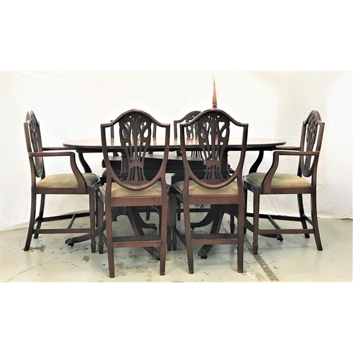 83 - REGENCY STYLE MAHOGANY D END DINING TABLE
with an extra leaf, standing on twin turned columns, each ... 