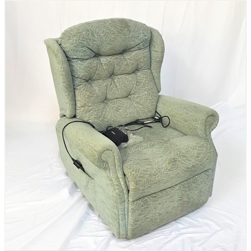 102 - CELEBRITY RISE AND RECLINE ELECTRIC ARMCHAIR
covered in a patterned green material, with power lead ... 