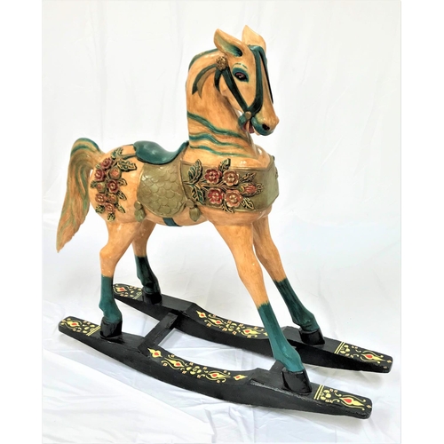 111 - THREE QUARTER SIZE WOOD AND POLYCHROME ROCKING HORSE
on a bow rocker base, 142cm x 141cm