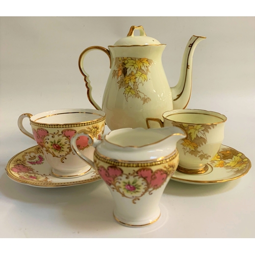 151 - ROYAL STAFFORD COFFEE SERVICE
the white ground decorated with yellow leaves with gilt highlights, co... 