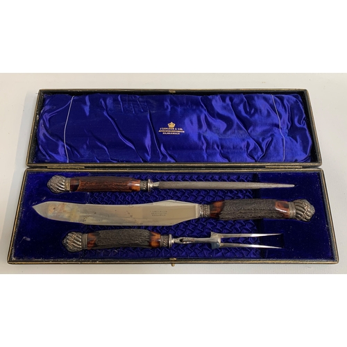 184 - LATE VICTORIAN HORN HANDLED CARVING SET
comprising knife, fork and steel, the knife marked J. Camero... 