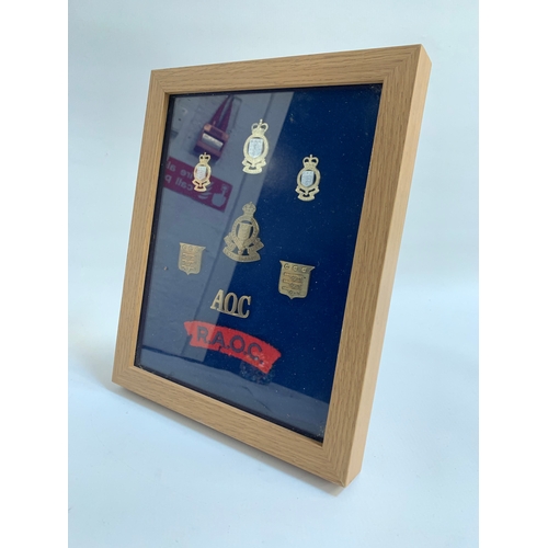 267 - ROYAL ARMY ORDANCE CORPS
set of regimental badges, including four brass and three gilt badges and a ... 