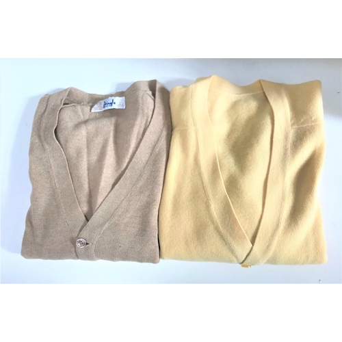 256 - PRINGLE OF SCOTLAND LAMSWOOL V-NECK CARDIGAN
in fawn (36ins/92cms), with label and protective bag; t... 