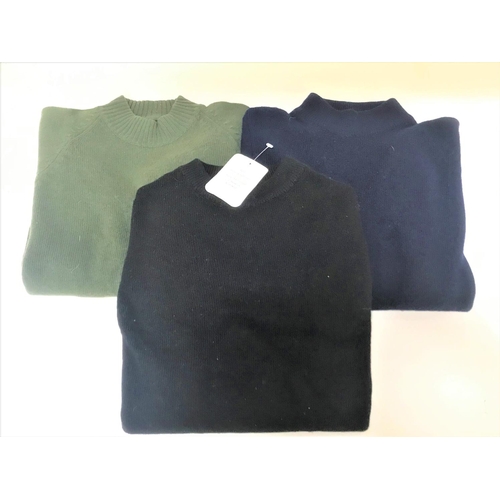 260 - TWO CASHMERE HIGH NECK JUMPERS
the navy blue jumper marked '100% Cashmere Made in Scotland', the gre... 