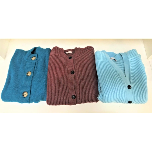 264 - THREE HEAVY LAMBSWOOL CARDIGANS
of various designs, in light blue, teal and orange/brown (3)