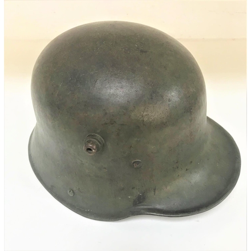 297 - WWI GERMAN STEEL HELMET
with original liner