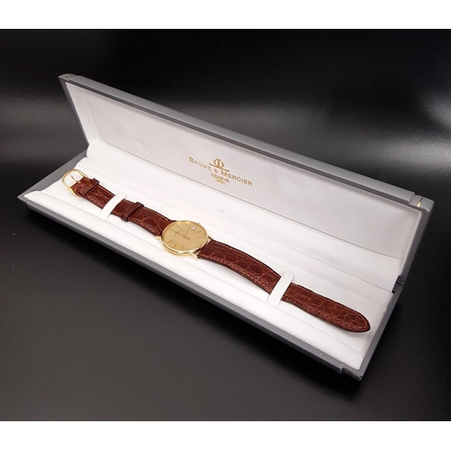 81 - GENTLEMEN'S BAUME & MERCIER EIGHTEEN CARAT GOLD CASED WRISTWATCH
the gilt dial with baton five minut... 