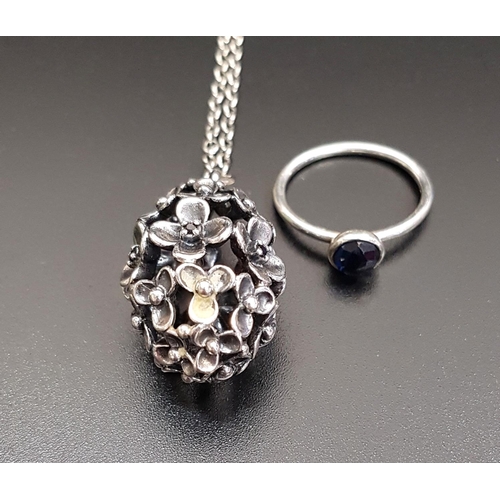 90 - PANDORA SILVER FLOWER DECORATED PENDANT ON CHAIN
the ovoid pendant formed with multiple black CZ set... 