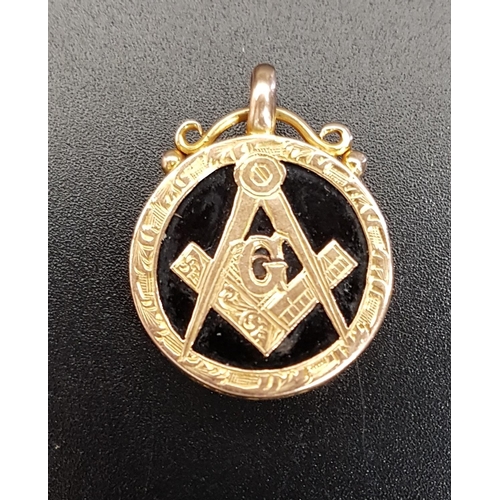 91 - MASONIC FIFTEEN CARAT GOLD AND BLACK AGATE FOB
the circular black agate with applied fifteen carat g... 