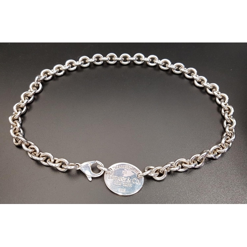 94 - TIFFANY AND CO. SILVER RETURN TO TIFFANY OVAL TAG CHOKER
the belcher link chain with oval tag engrav... 