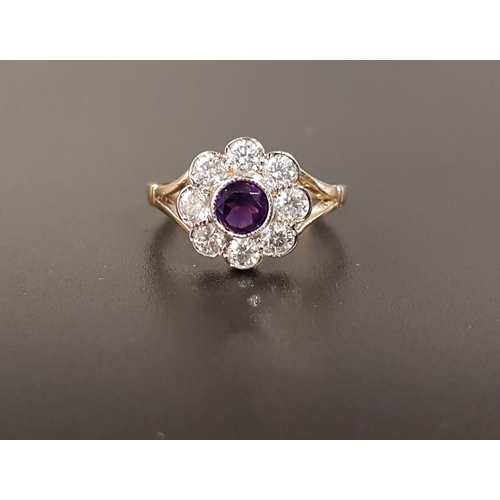 95 - AMETHYST AND DIAMOND CLUSTER RING
the central round cut amethyst approximately 0.4cts in eight diamo... 