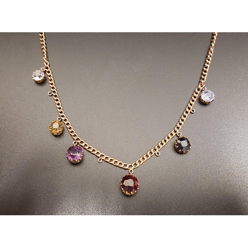 106 - GEM SET UNMARKED GOLD CURB LINK NECK CHAIN
the chain with six gemstone drops and loops for an additi... 