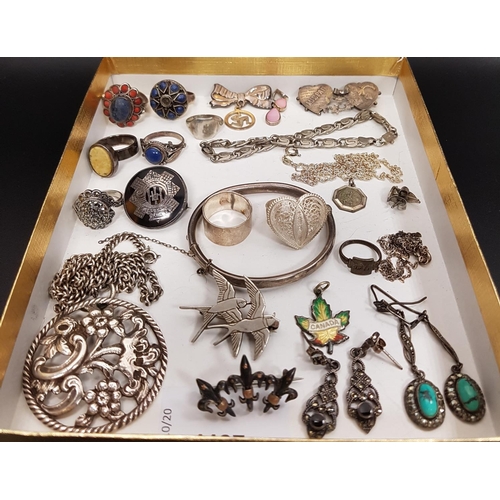 107 - SELECTION OF SILVER JEWELLERY
including various stone set rings, a pierced floral decorated pendant ... 