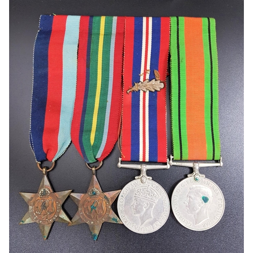 305 - WWII GROUP OF FOUR MEDALS
comprising The 1039-1945 Star, The Pacific Star, The War Medal with applie... 