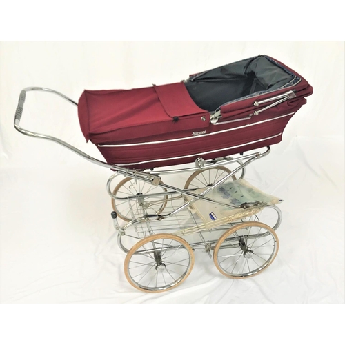 207 - MARMET PRAM
with a burgundy body with rain cover and folding hood on a four wheel chrome folding fra... 