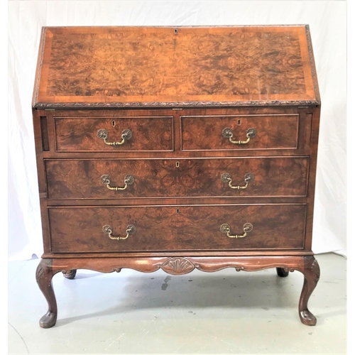 387 - WALNUT AND FIGURED WALNUT BUREAU
with a crossbanded fall flap opening to reveal a fitted interior ab... 