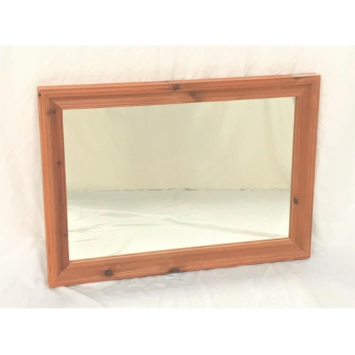 453 - OBLONG PINE WALL MIRROR
with a plain plate, 63cm x 88cm