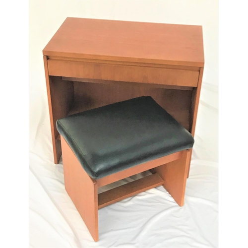 478 - RETRO TEAK DRESSING TABLE
with a plain top above a flush frieze stepped drawer with shaped undertier... 