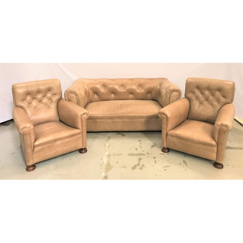 484 - CHESTERFIELD SUITE
comprising a button back sofa with scroll arms and two button back armchairs with... 