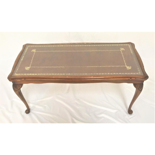 485 - MAHOGANY OCCASIONAL TABLE
the oblong top with inset leather under glass, standing on cabriole suppor... 