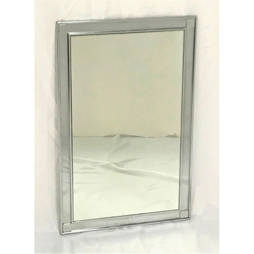 491 - POLISHED STEEL WALL MIRROR
with a rectangular plain plate, 64cm high