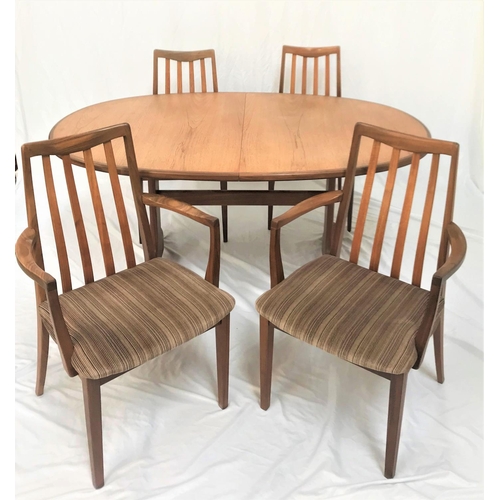 496 - G PLAN TEAK D END DINING TABLE
with a pull apart top revealing a fold out leaf, standing on twin sup... 