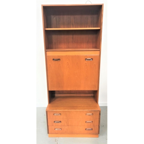 499 - G PLAN ILLUMINATED TEAK WALL UNIT
with two shelves above a fall flap, the base with three drawers, s... 