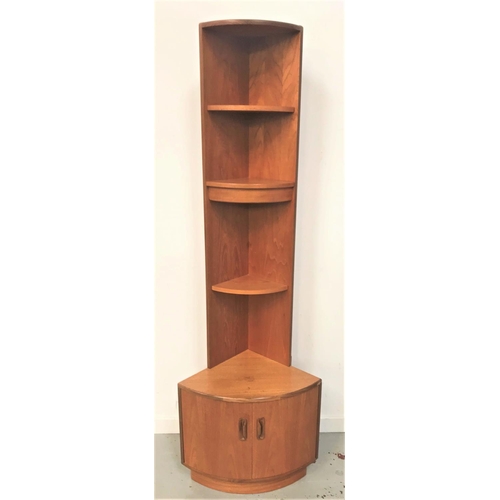 500 - G PLAN TEAK NARROW CORNER UNIT
with a curved plain top above three shelves, the shaped base with a p... 