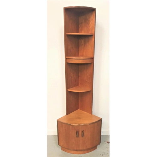 501 - G PLAN TEAK NARROW CORNER UNIT
with a curved plain top above three shelves, the shaped base with a p... 