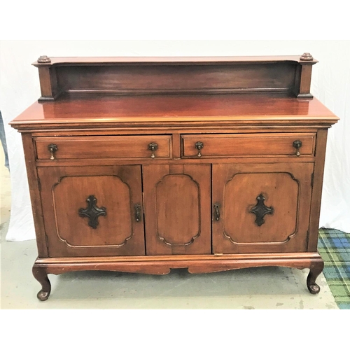 506 - MAHOGANY SIDEBOARD
with a raised back with a shelf above a moulded top with two panelled drawers abo... 