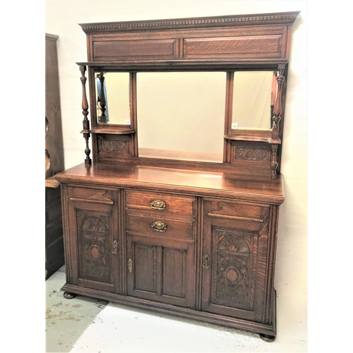 507 - EDWARDIAN OAK MIRROR BACK SIDEBOARD
with a carved dentil pediment above a moulded shelf with three b... 