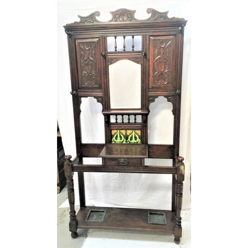 508 - ART NOUVEAU HALL STAND
with a carved top with shell motif above a central shaped bevelled mirror wit... 