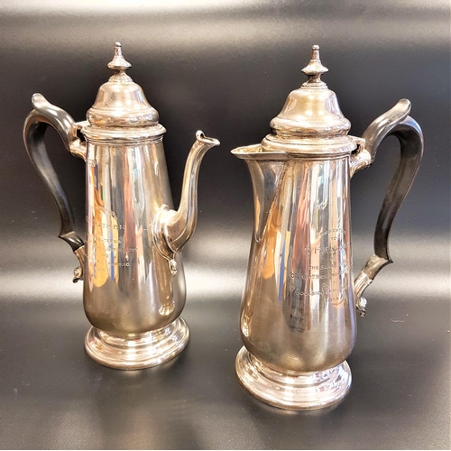 135 - GEORGE V SILVER TEA POT AND COMPANION HOT WATER JUG
both of baluster form with scroll shaped ebonise... 