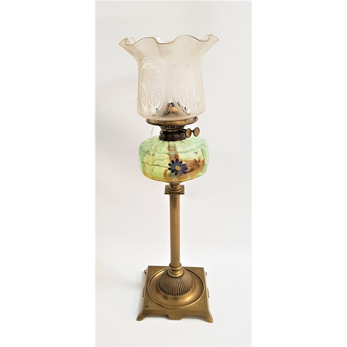 202 - EDWARDIAN OIL LAMP
with a brass square base and turned column, the reservoir painted with flowers, a... 