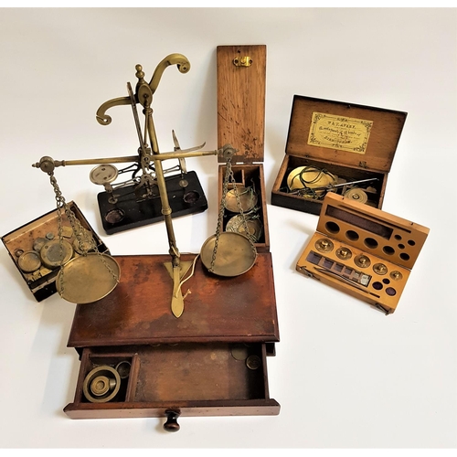 219 - SELECTION OF WEIGHING SCALES
including a travelling brass set in a mahogany box with weights, cased ... 