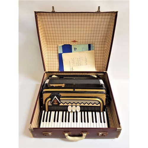 231 - FRONTALINI ACCORDIAN
with a black and gold coloured body, shoulder straps and travelling case. With ... 