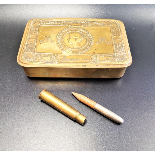 287 - WWI BRASS EMBOSSED CHRISTMAS TIN
decorated with Princess Mary, together with bullet pencil (2)