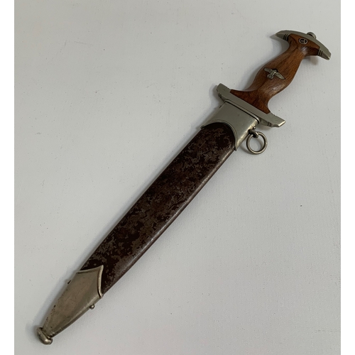 461 - THIRD REICH DRESS DAGGER
with a brown hardwood handle inset with eagle and enamel SA, the blade mark... 