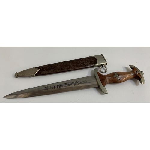 461 - THIRD REICH DRESS DAGGER
with a brown hardwood handle inset with eagle and enamel SA, the blade mark... 